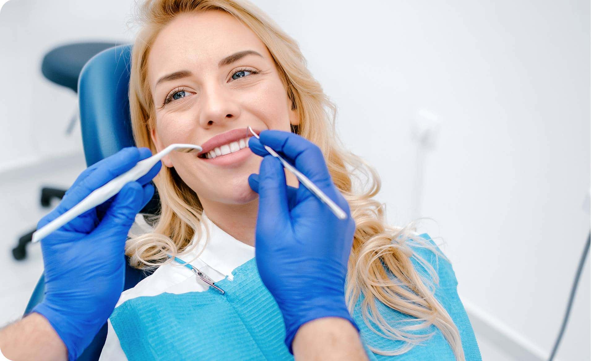 https://www.istockphoto.com/au/photo/woman-having-teeth-examining-at-dentist-gm1190798549-337690744